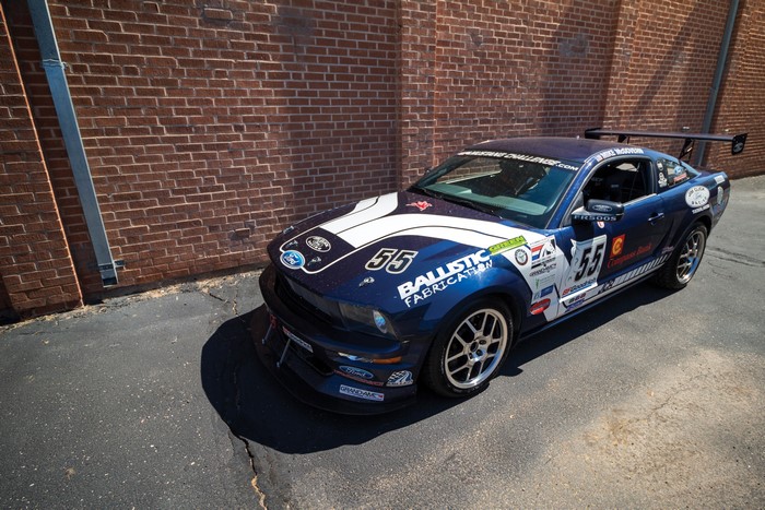 Blue 2008 Mustang FR500S race car with number 55