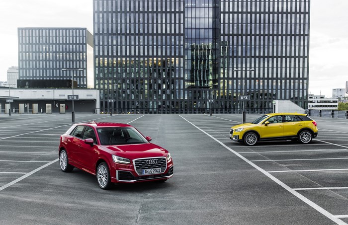 Two Audi Q2 cars in a parking lot