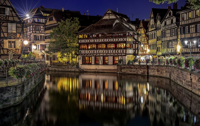 Strasbourg canal at night with historic buildings