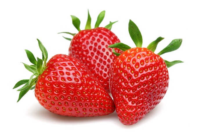Three Strawberries on White Background