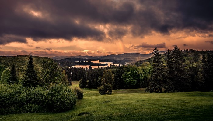 Stormy Sky Over Forest and Lakes