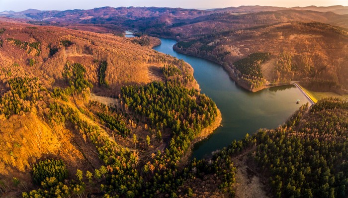 Aerial view of Liskovec, Czech Republic with river and forests