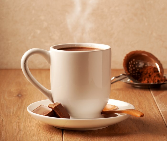 Hot Chocolate in a White Mug with Chocolate Pieces
