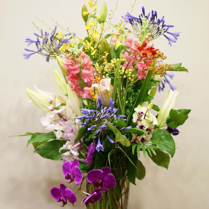 Orchid, Antirrhinum, and Lily Flower Arrangement