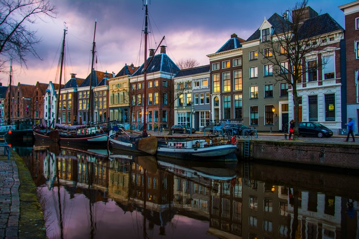 Canal with boats and houses in Groningen, Netherlands