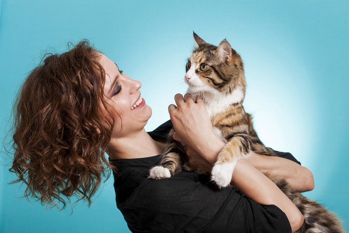 Woman Holding a Cat
