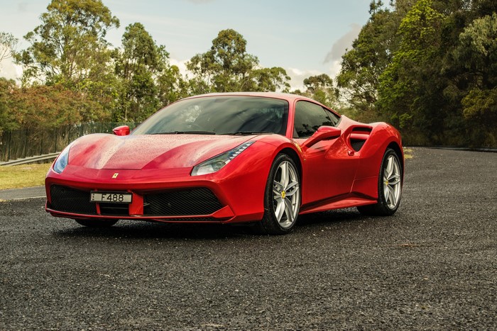 Red Ferrari 488 GTB on a Road
