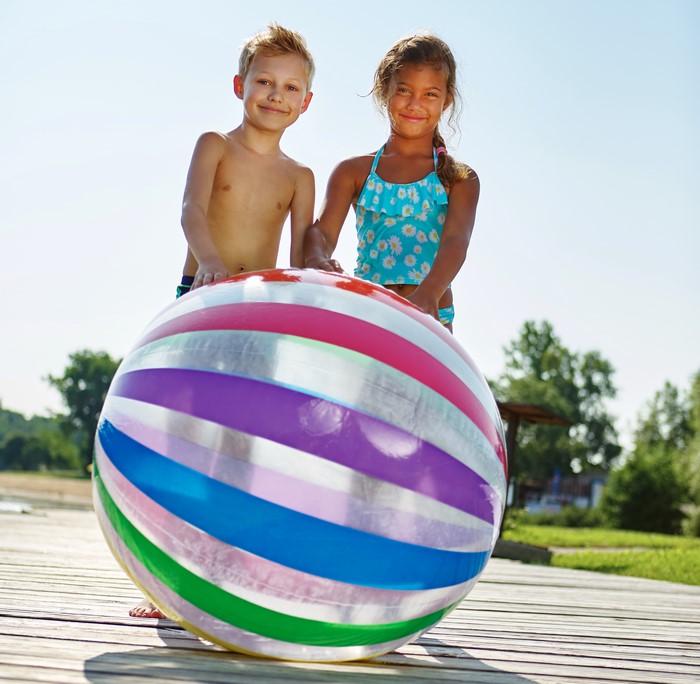 Two children with a beach ball
