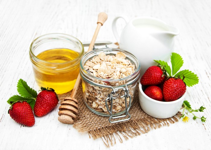 Oatmeal with strawberries, honey, and milk
