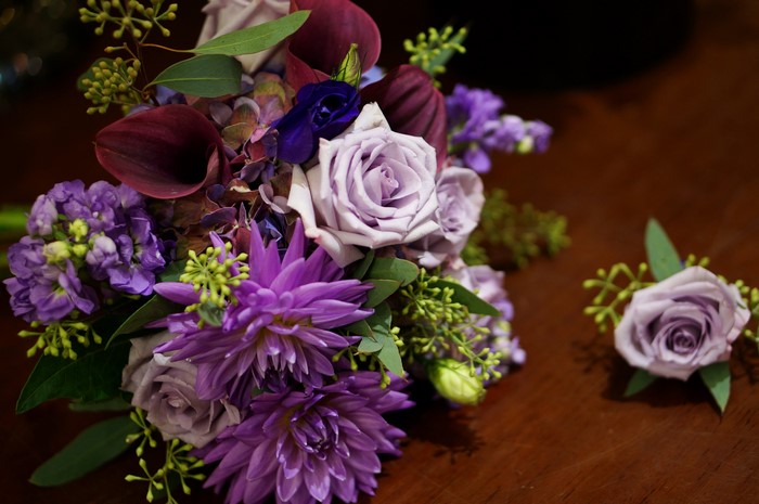 Purple and Burgundy Floral Arrangement with Boutonniere