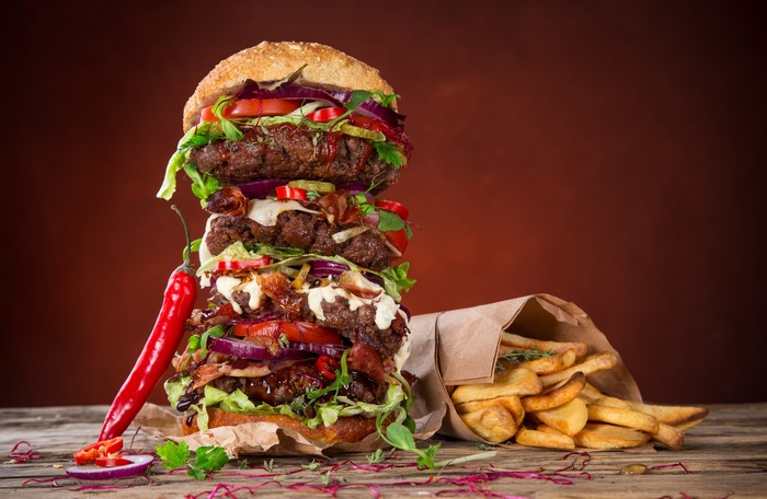 Giant Hamburger with French Fries and Red Chili Pepper