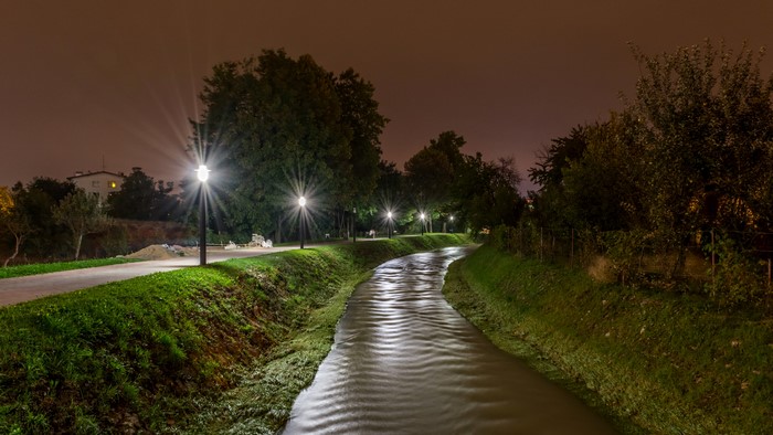 Night view of a river and park with street lights in Samobor, Croatia
