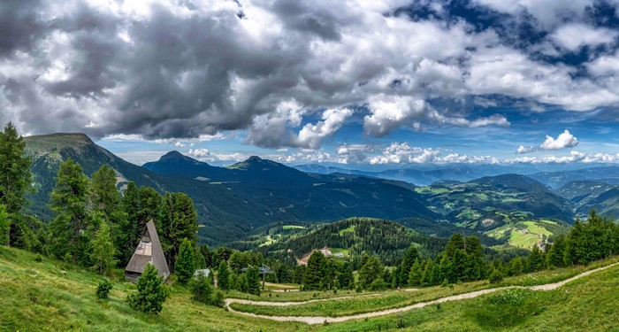 Panoramic mountain landscape with clouds in Bolzano, Italy