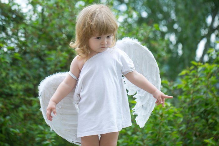Little girl with angel wings