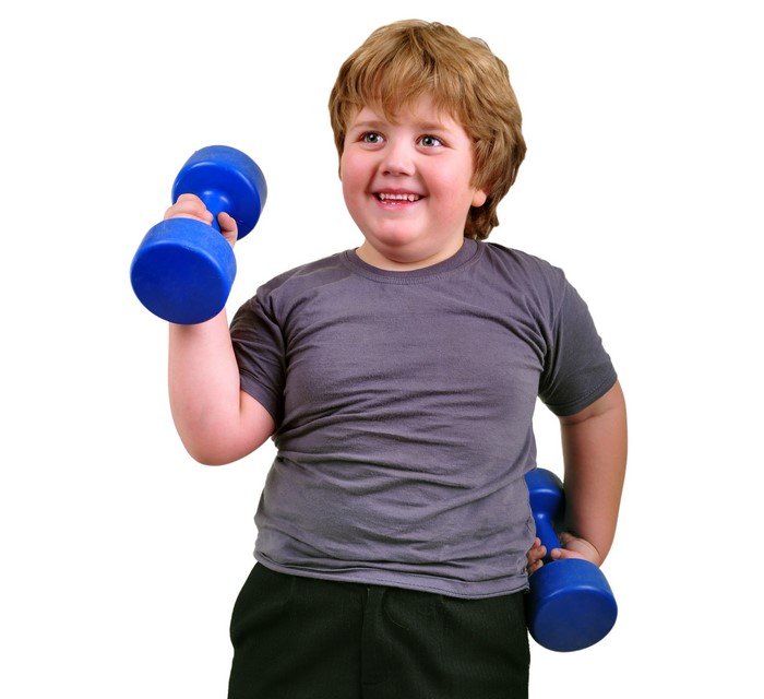Boy with dumbbells exercising