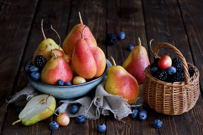Pears, Blueberries, and Blackberries in a Wicker Basket