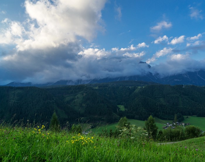 Mountain landscape with clouds and green hills