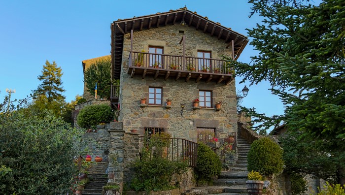 Stone house with balcony and stairs in Rupit i Pruit, Catalonia, Spain
