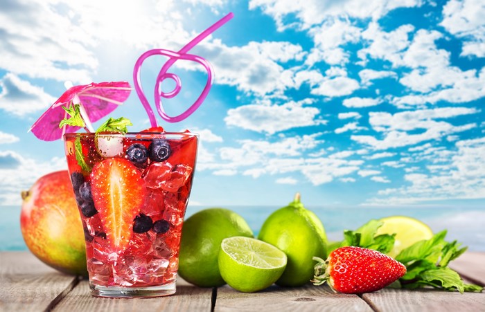 Fruit cocktail with strawberry, blueberries, lime, mango, and mint