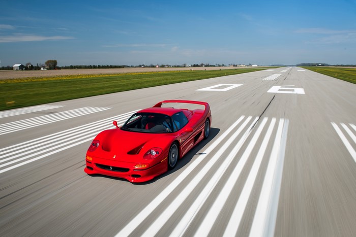Red Ferrari F50 on a Racetrack