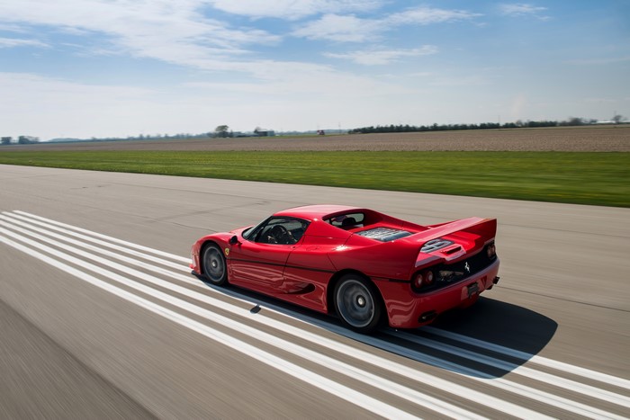 Red Ferrari F50 on a Racetrack