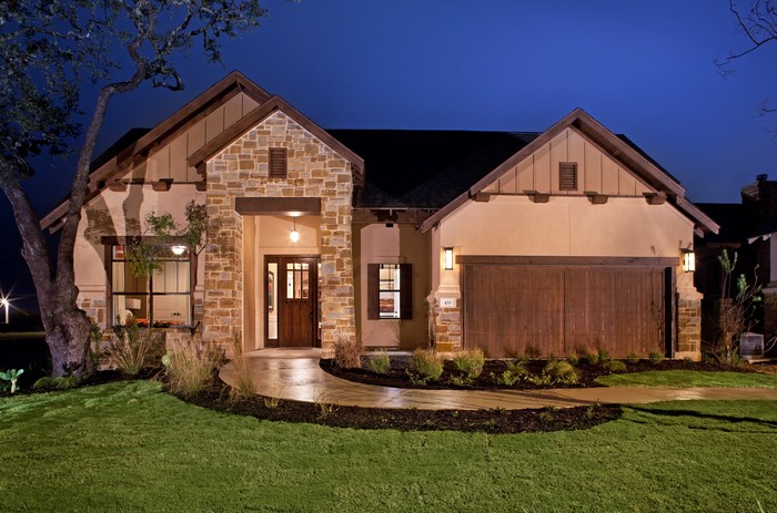 Luxury House with Stone Accents at Night