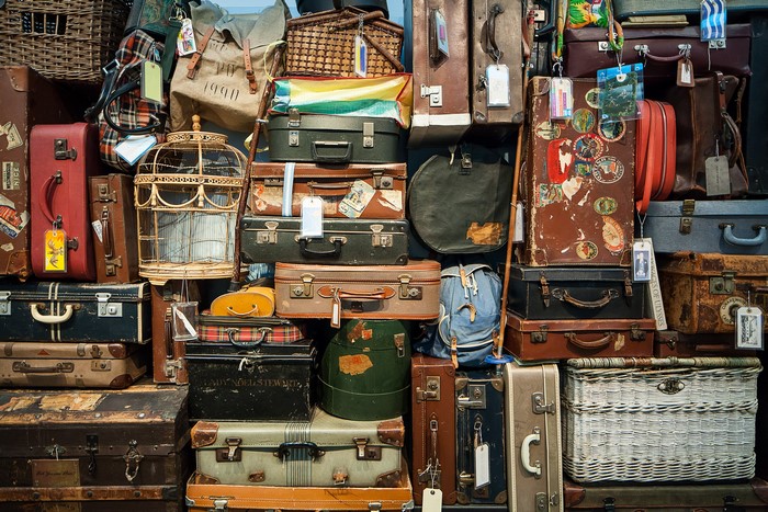 Collection of vintage suitcases and luggage