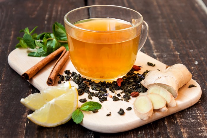 Tea with lemon, cinnamon, ginger, and mint