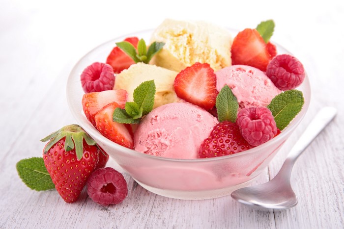 Ice cream with strawberries and raspberries