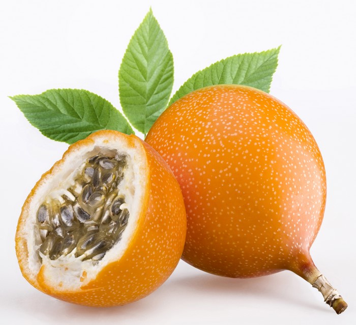 Passion fruit with leaves on white background