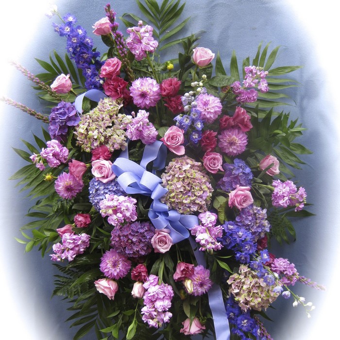 Floral arrangement with roses, dahlias, and hydrangea