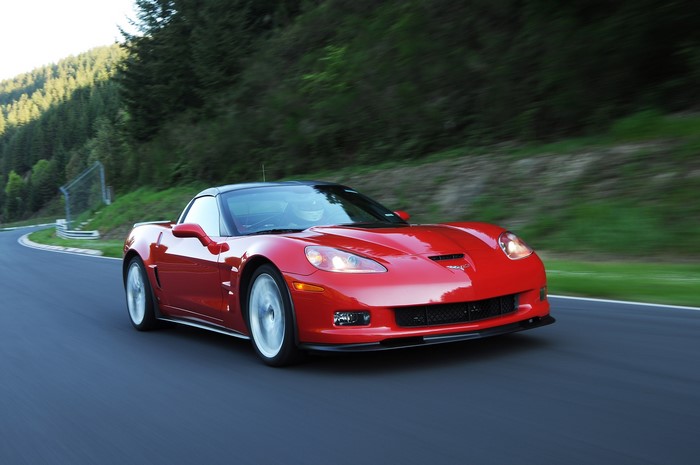 Red Chevrolet Corvette ZR1 on a race track