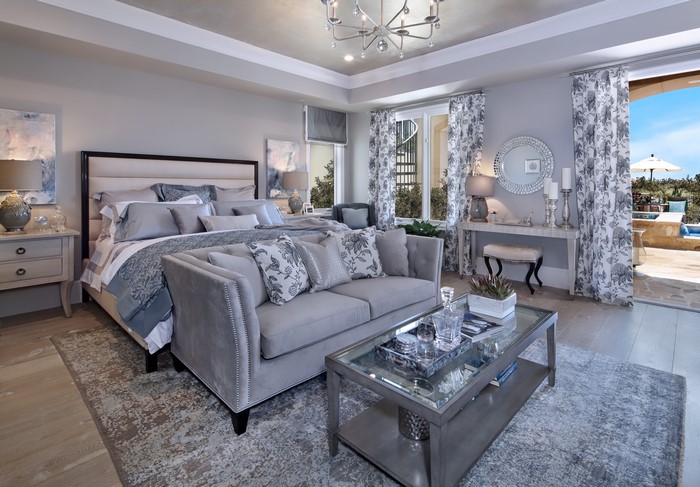 Bedroom with Bed, Sofa, and Table