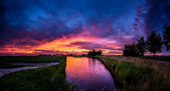 Sunset over a canal in the Netherlands