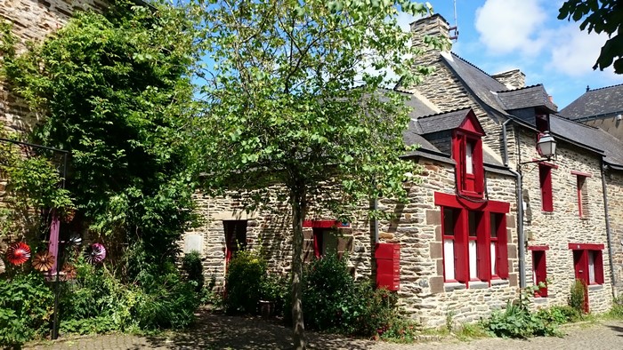 Stone Houses with Red Shutters in Brittany, France