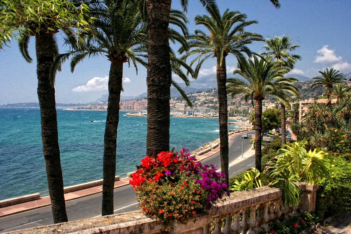 Menton, France coast with palm trees and buildings