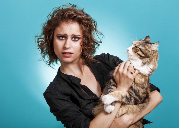 Woman holding a cat