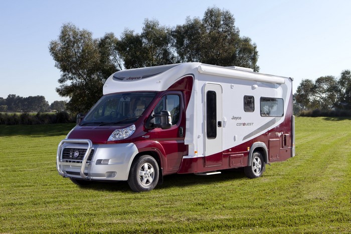 Jayco Conquest motorhome parked on a grassy field