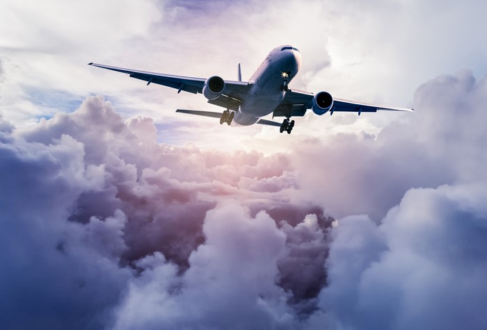 Airplane flying through clouds