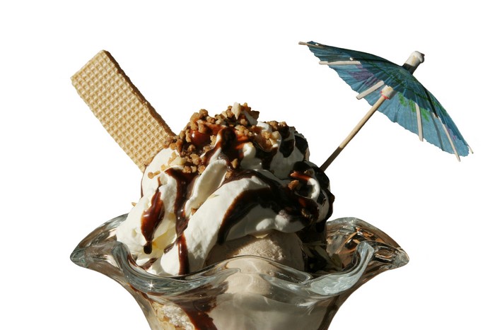 Ice cream sundae with wafer and umbrella