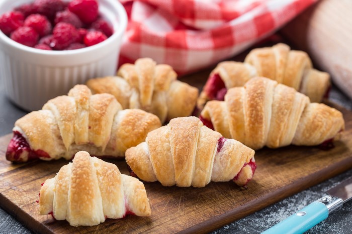 Raspberry Croissants on a Wooden Board