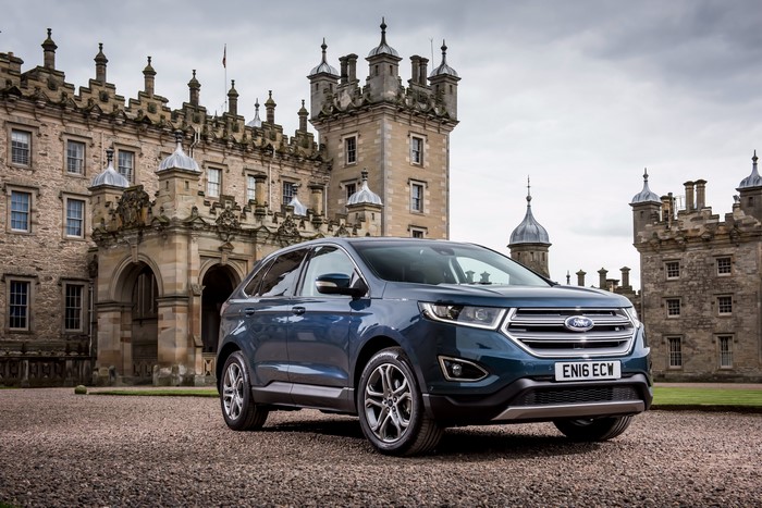 Ford Edge SUV parked in front of a castle