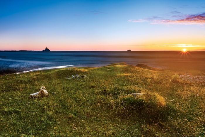 Sunset over the sea with Mont Saint-Michel