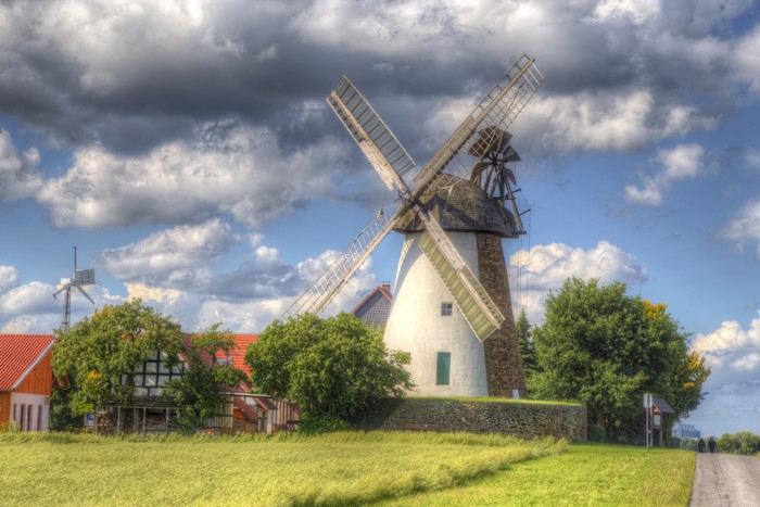 Windmill and houses in Ostwestfalen, Germany