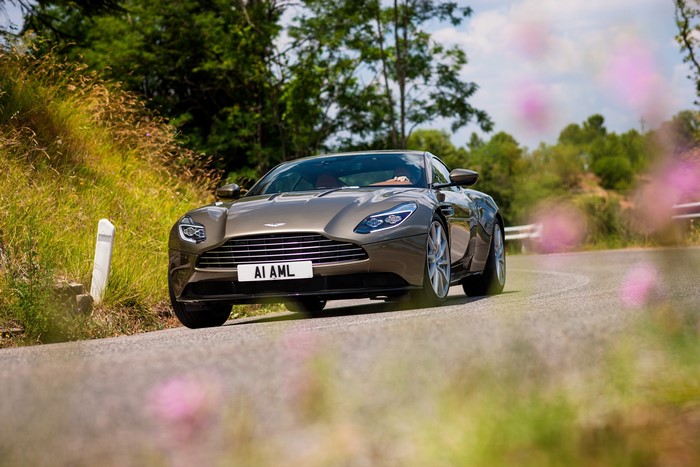 Aston Martin DB11 on a winding road