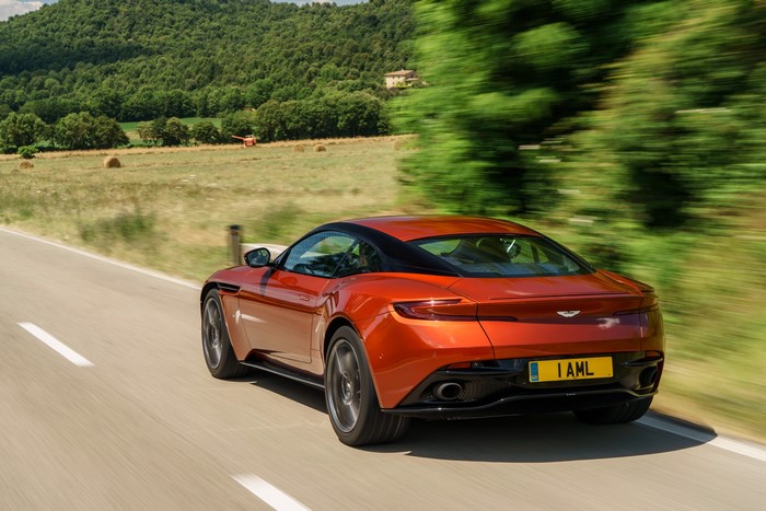 Aston Martin DB11 driving on a country road