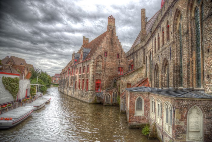 Canal in Bruges, Belgium with historic buildings and boats