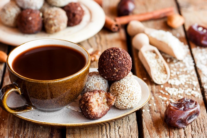 Coffee cup with sweets and ingredients