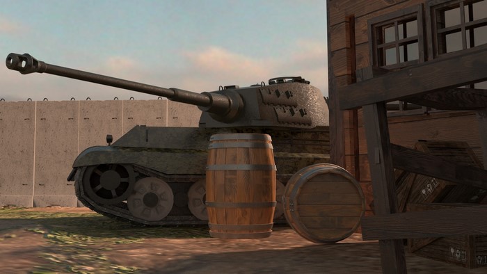 Panther tank and barrels near a wooden building