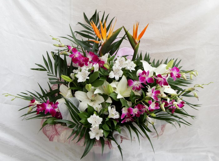Bouquet of Lilies, Orchids, and Bird of Paradise flowers